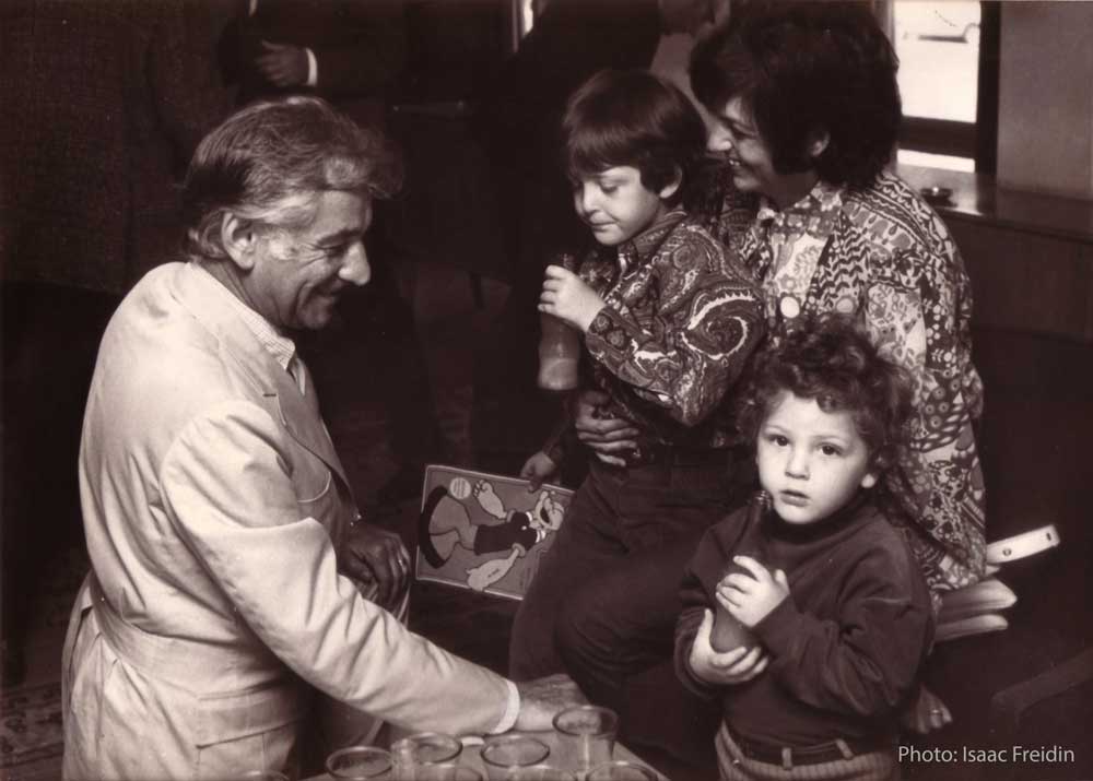 Ady Cohen, age 6, on his pianist mother Ruth Menze's lap, his brother Sharon and his future patron, Maestro Leonard Bernstein
